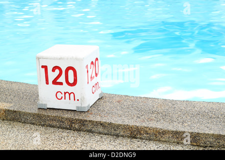 120 cm. water depth sign at swimming pool Stock Photo