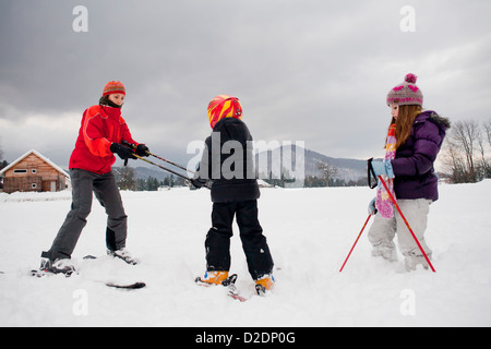 Ski lesson - family on snow. Stock Photo