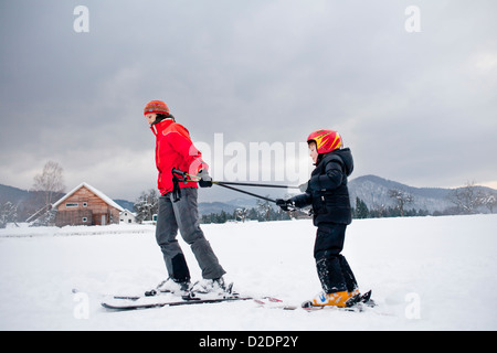 Ski lesson - family on snow. Stock Photo