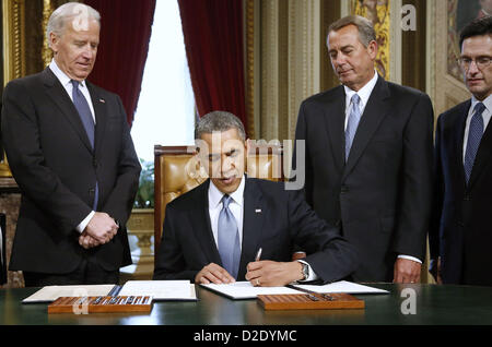 Jan. 21, 2013 - Washington, District Of Columbia, USA - President Barack Obama signs a proclamation to commemorate the inauguration, entitled a National Day of Hope and Resolve, on Capitol Hill in Washington, Monday, Jan. 21, 2013, following his ceremonial swearing-in ceremony during the 57th Presidential Inauguration. From, left are, Vice President Joe Biden, House Speaker John Boehner  of Ohio and House Majority Leader Eric Cantor of Va. (Credit Image: © Jonathan Ernst/Pool/Prensa Internacional/ZUMAPRESS.com) Stock Photo