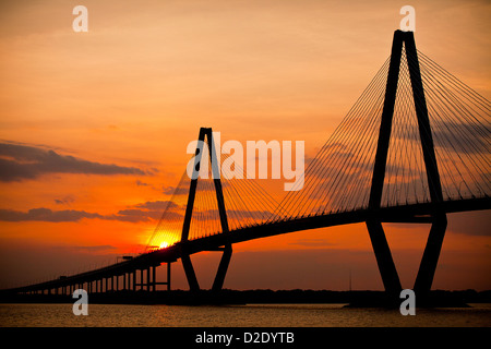 Sunset over the Arthur Ravenel Jr. bridge in Charleston, SC Stock Photo