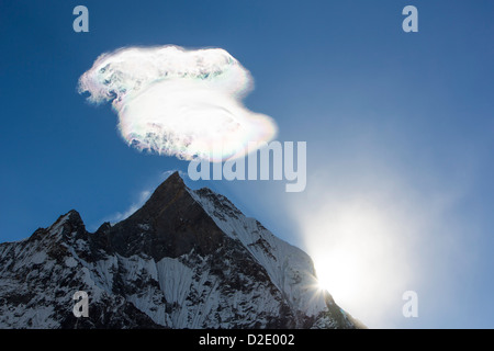 Jet stream winds over Machapuchare in the Annapurna Himalayas in Nepal. Stock Photo