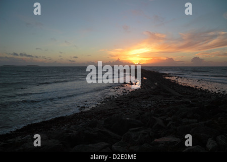 Sunset over the Irish Sea viewed from Kilmore Quay, Co Wexford, southern Ireland. Stock Photo