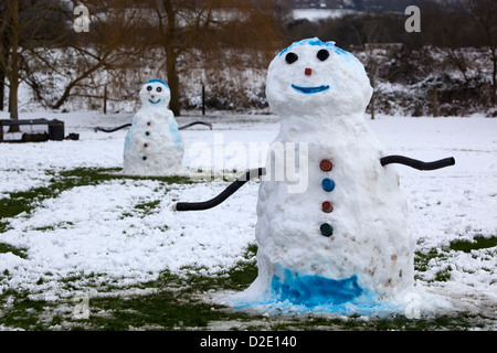 Two Snowmen in Park Stock Photo