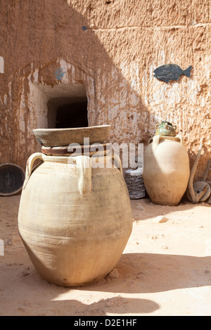 Typical yard of an underground house of troglodytes in Tunisian village Matmata, Tunisia. Stock Photo