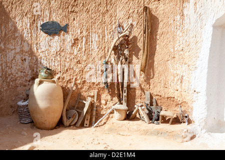 Typical yard of an underground house of troglodytes in Tunisian village Matmata, Tunisia. Stock Photo