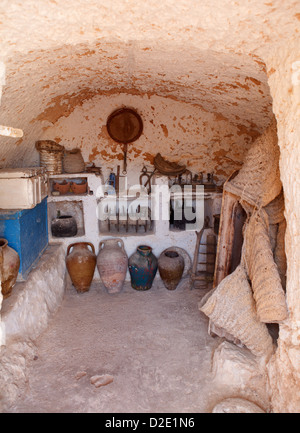 Typical yard of an underground house of troglodytes in Tunisian village Matmata, Tunisia. Stock Photo