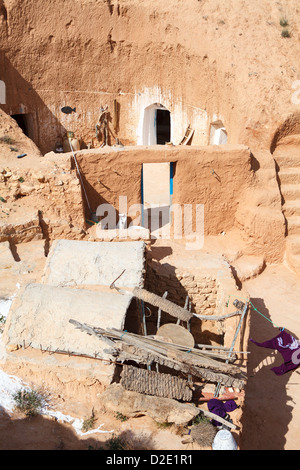 Typical yard of an underground house of troglodytes in Tunisian village Matmata, Tunisia. Stock Photo