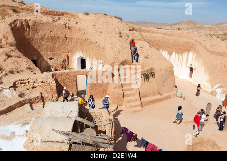 Typical yard of an underground house of troglodytes in Tunisian village Matmata, Tunisia. Stock Photo