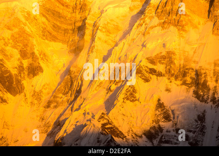 Alpenglow at sunrise on Annapurna One, Nepelese Himalayas. Stock Photo