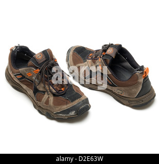 One pair of worn out brown Timberland hiking shoes Stock Photo