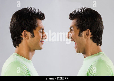 Digital composite image of a man yelling at self Stock Photo
