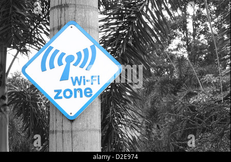 Wi-Fi zone sign on tree in the garden Stock Photo