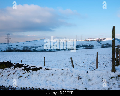 Distant view of Hartshead Pike in winter, Ashton-under-Lyne, Lancashire, UK. Stock Photo