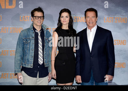 Actors Johnny Knoxville, Arnold Schwarzenegger, and Jamie Alexander attend to the Photocall of the movie 'The Last Stand' in Cologne, Germany, on January 21, 2013. Stock Photo