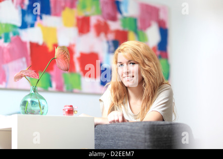 France, young woman at home Stock Photo