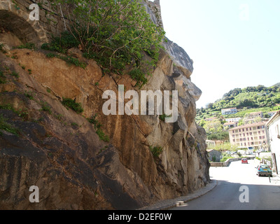 Big rocks at a street in Sartene on Corsica Stock Photo
