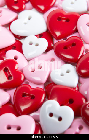 Overhead View Of Heart Shaped Buttons Stock Photo