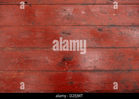 Old red dirty teble boards with rain drops. High quality image, great for backgrounds and modern grunge designs. Stock Photo