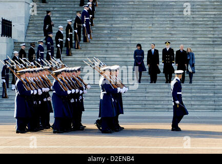 The United States Coast Guard Honor Guard performs a pass and review as President Barack Obama, First Lady Michelle Obama, Vice President Joe Biden and wife Jill Biden depart the US Capitol for the Inauguration Parade down Pennsylvania Avenue to the White House January 21, 2013 in Washington, DC. Stock Photo