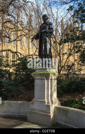 A statue of suffragette Emmeline Pankhurst outside the Houses of Parliament, London Stock Photo