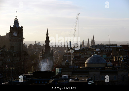 Edinburgh skyline from Calton Hill.  With ferris wheel for German Christmas market and construction crane Stock Photo