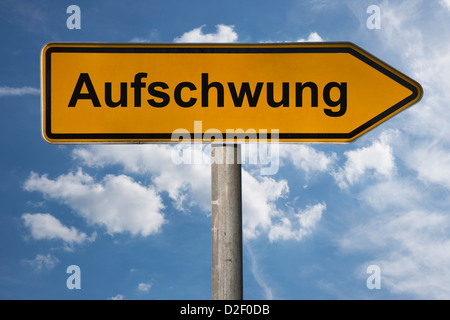 Detailansicht eines Wegweisers mit der Aufschrift Aufschwung | Detail photo of a signpost with the German inscription upswing Stock Photo
