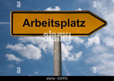 Detailansicht eines Wegweisers mit der Aufschrift Arbeitsplatz | Detail photo of a signpost with the title job in German Stock Photo