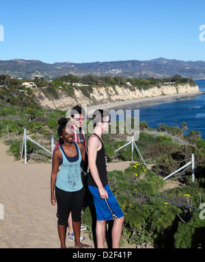 Friends sightsee at Point Dume State Preserve in Malibu, California Stock Photo