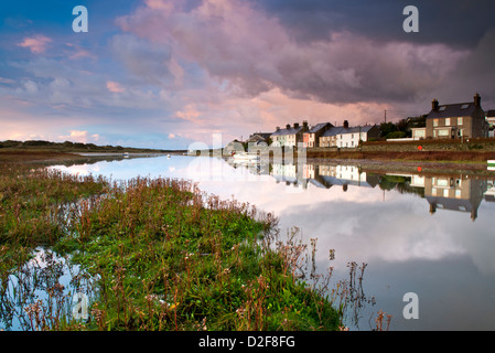 Storm Clouds Gather over Afon Ffraw & Riverside Cottages, Aberffraw, Anglesey, North Wales, UK Stock Photo