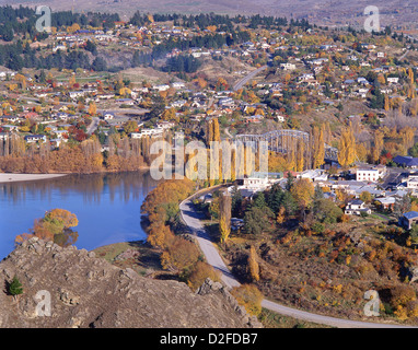 View of town and Clutha River in autumn colours, Alexandra, Central Otago District, Otago Region, South Island, New Zealand Stock Photo