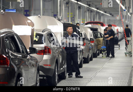 Vehicles of the X1 series are mounted at the production plant of BMW-Brilliance Automotive in Shenyang-Tiexi, China. Picture taken on 12 October 2012. Stock Photo