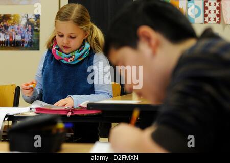 Students of the learn-family, the 'seals' join the class, in Bonn, Germany, 22 January 2012. Because of an exemplary, inclusive learning style, the school receives the Jakob-Muth-award. Photo: Marius Becker Stock Photo