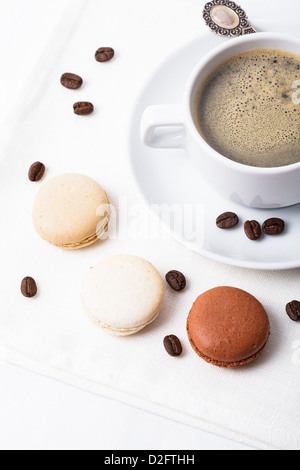 Three colors of macaroons in brown and beige tones Stock Photo