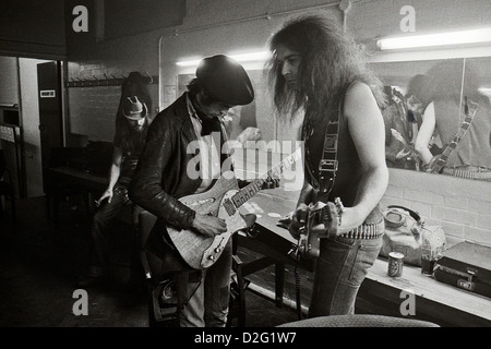 Pink Fairies guitarist Larry Wallis backstage tuning his guitar before a gig in 1975 at Dingwalls in Camden London England UK  KATHY DEWITT Stock Photo