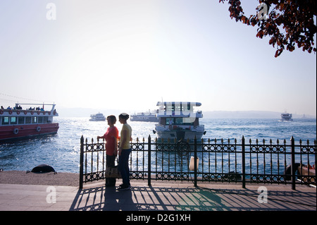 TURKEY, ISTANBUL: Tourists at Bosporus shore in Kabatas. Stock Photo