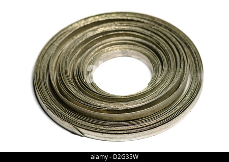 A coil of magnesium ribbon, a chemical element which burns with an incredibly bright white flame, and used in marine flares Stock Photo