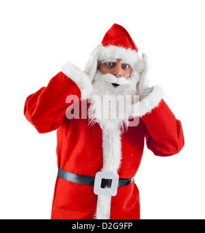 Santa Claus caught with his hands on his head Stock Photo