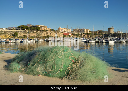 Campello fishing harbor with a traditional trawl in the foreground, Costa Blanca, Spain Stock Photo