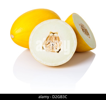 Two honeydew melons on white background. One sliced in half, second whole Stock Photo