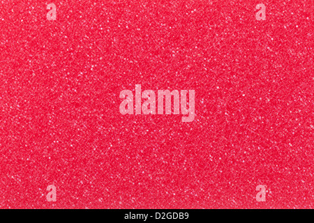 Red cleaning sponge texture for background. Top view Stock Photo