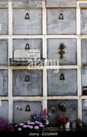 Above ground graves in mausoleum wall at St. Louis Cemetery No. 1 in ...