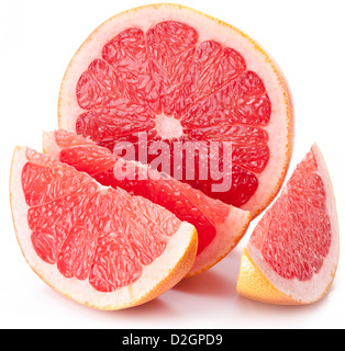 Grapefruit with slices on a white background. Stock Photo