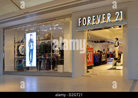 Forever 21 USA based fast fashion retailer clothing store business shop front in Westfield shopping mall at Lakeside West Thurrock Essex England UK Stock Photo