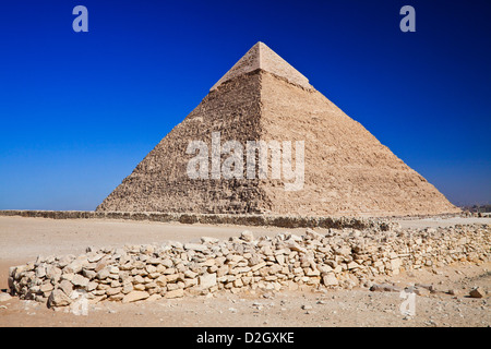 The Pyramid of Khafre, also known as Chephren, the second-largest of the complex or necropolis on the Giza plateau, Cairo, Egypt Stock Photo