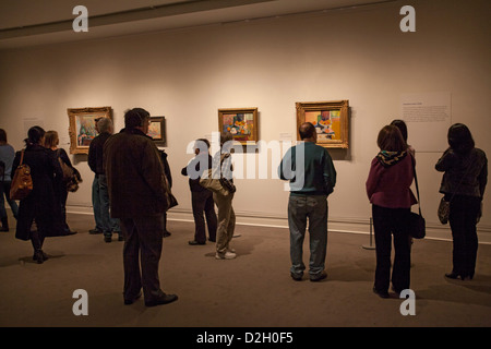Museum goers view a Matisse exhibit at the Metropolitan Museum of Art in New York City. Stock Photo