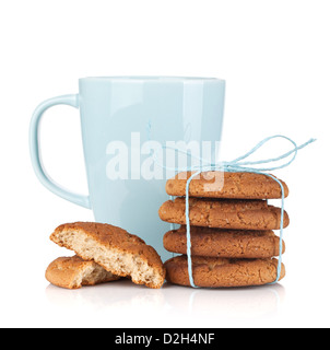 Milk cup with homemade cookies. Isolated on white background Stock Photo