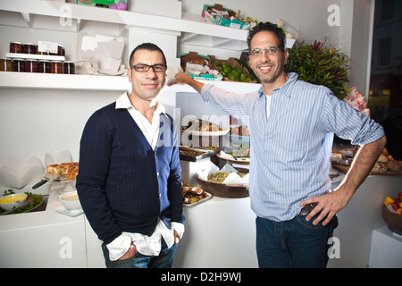 Restaurant owner Yotam Ottolenghi (right) with Sami Tamimi head chef at the Upper Street restaurant in Islington, London, UK Stock Photo