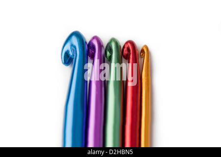 Selection of multi colored crochet hooks isolated on white Stock Photo
