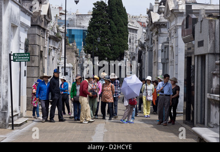 Group of Japanese tourists visiting La Recoleta Cemetery, in Buenos Aires, Argentina. Stock Photo